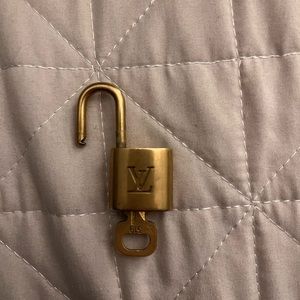 Authentic vintage Louis Vuitton lock + key